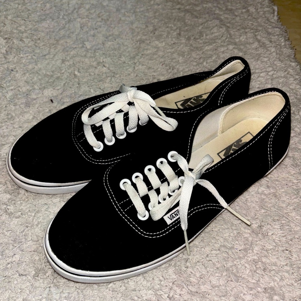 Women’s black Vans sneakers